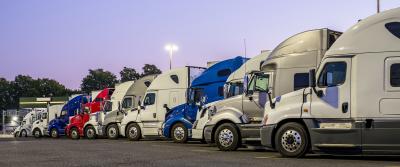 trucks parked in a row bg