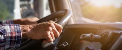 driver with hands on wheel