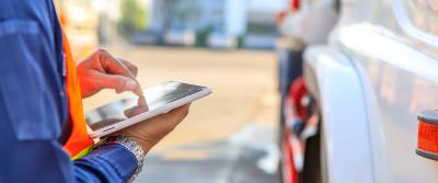 driver scrolling a tablet