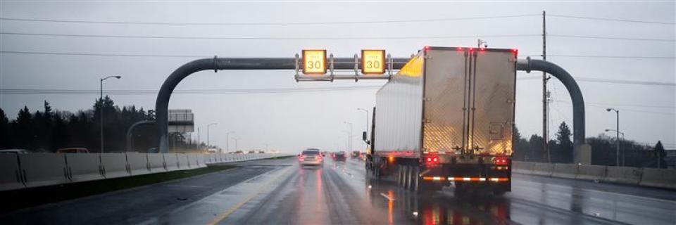 Truck driving in hurricane bg