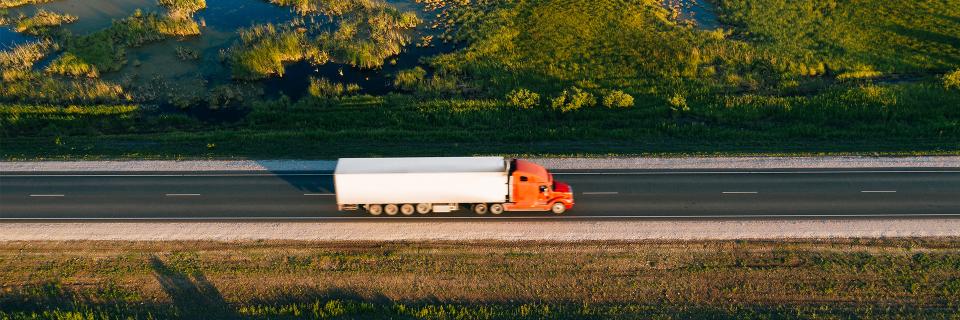 truck driving down highway