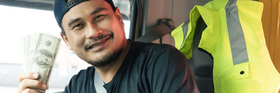 truck driver holding a cup