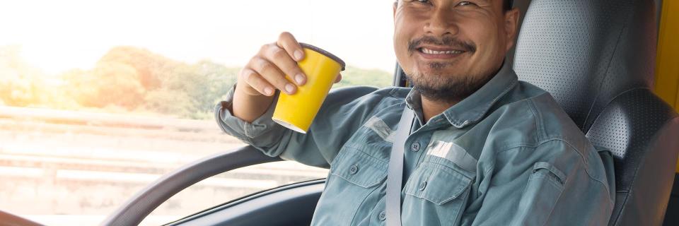 truck driver drinking coffee