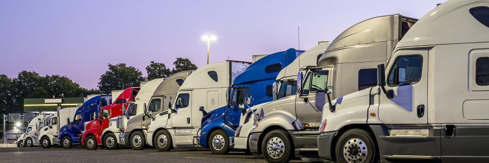 trucks parked in a row bg